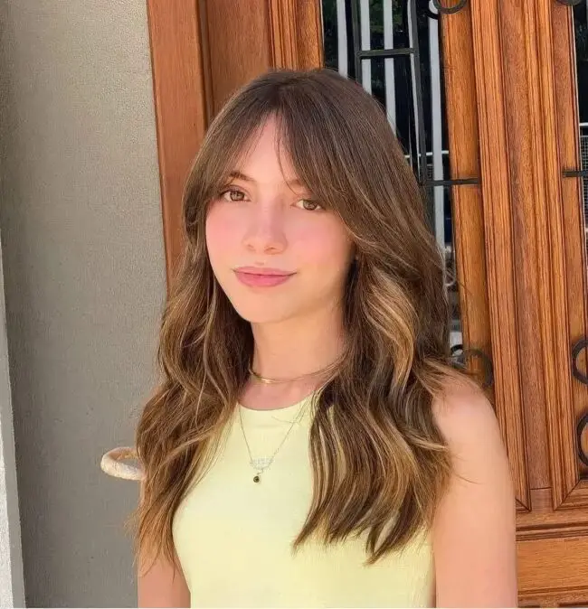 Caramel Highlights with Soft Curtain Bangs