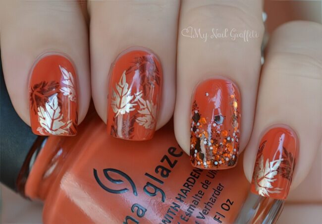 Autumn Orange Nails with Glitter Leaves