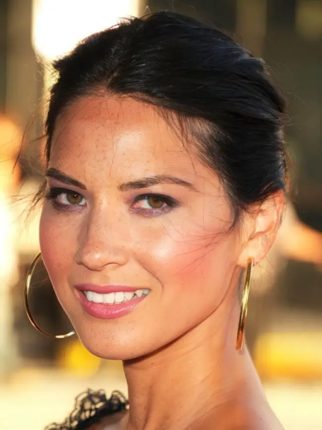 Radiant Glow with Bold Purple Eyeshadow