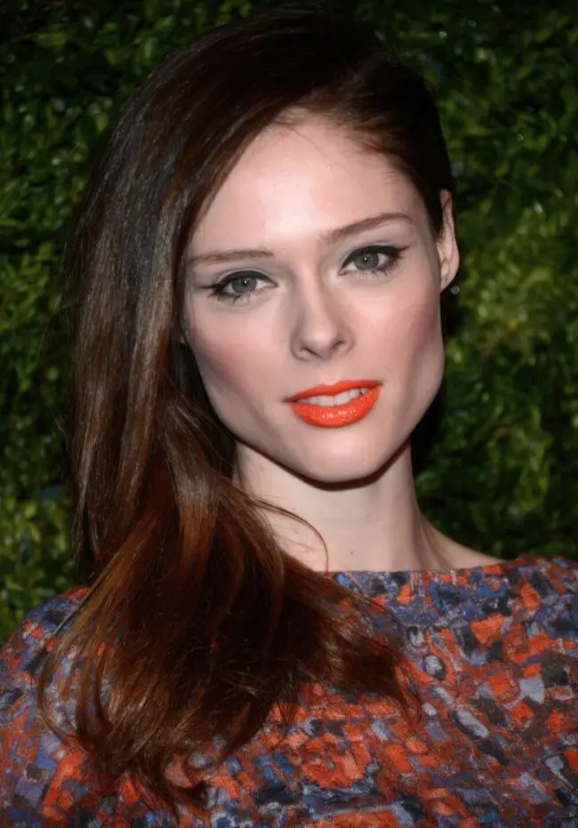 Striking Orange Lips with Glossy Waves
