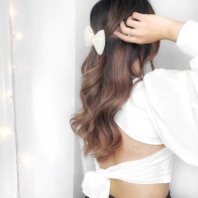 Elegant Waves with a Decorative Bow