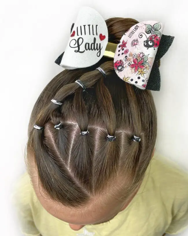 Zigzag Parted Braids Highlighted with a Bold Bow