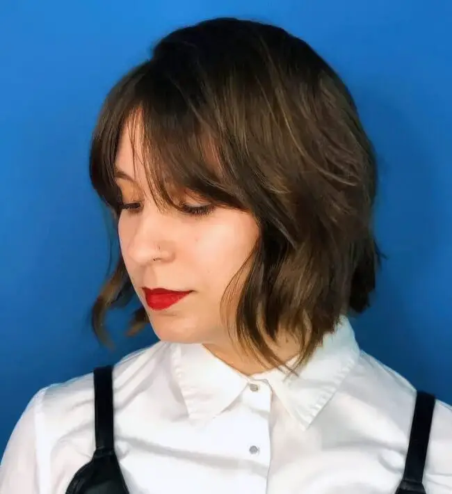 Bardot Bangs: Soft Waves Frame Faces