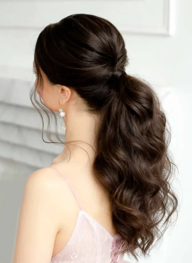 Full Voluminous Curly Ponytail