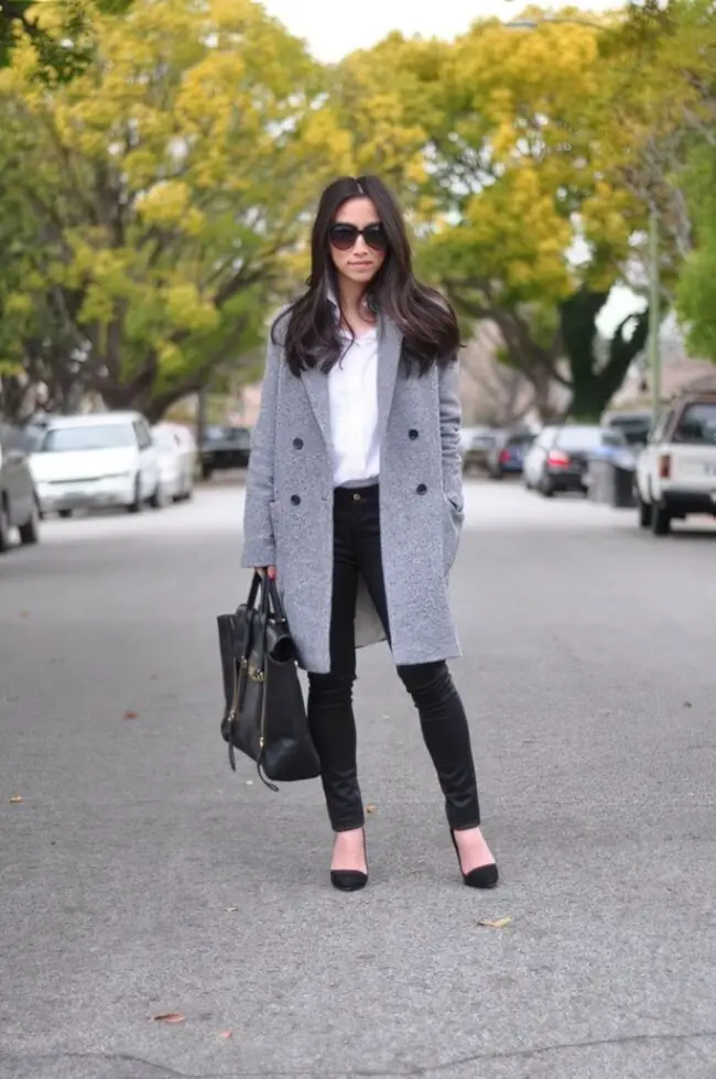 Chic Black Coat with Structured Handbag