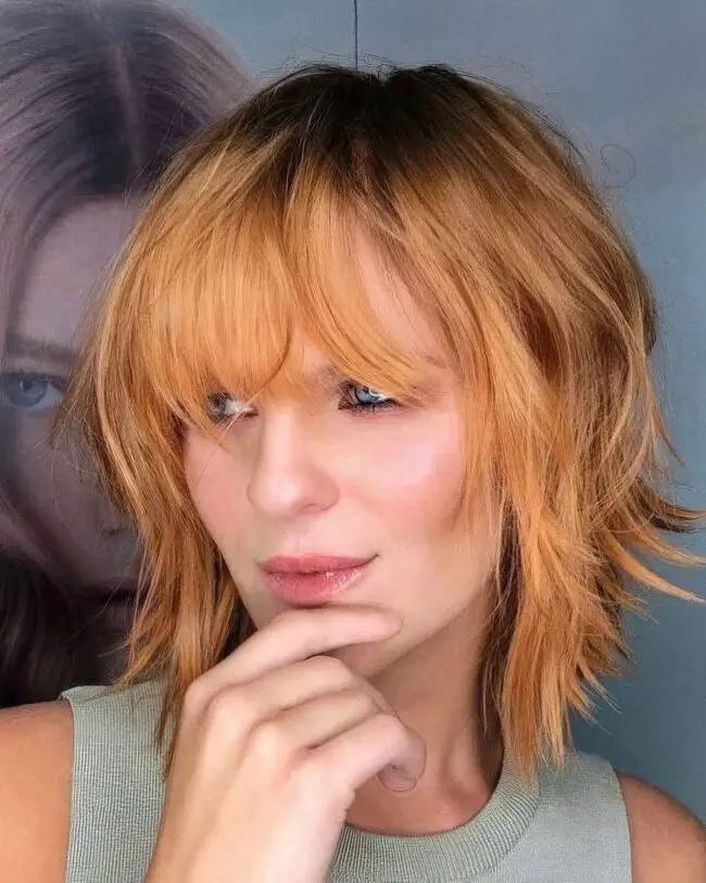 Golden Shag Cut with Chic Bangs