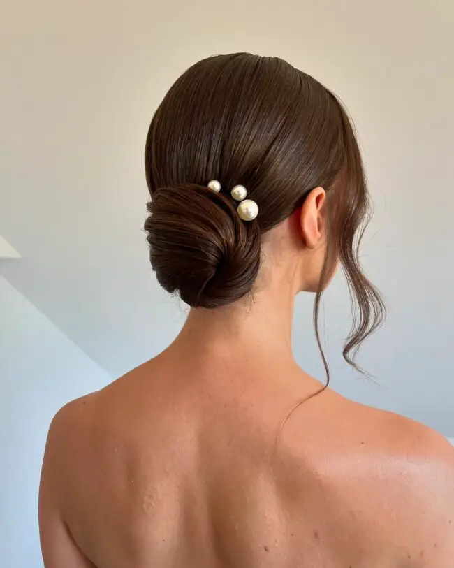 Polished Low Bun with Pearl Details
