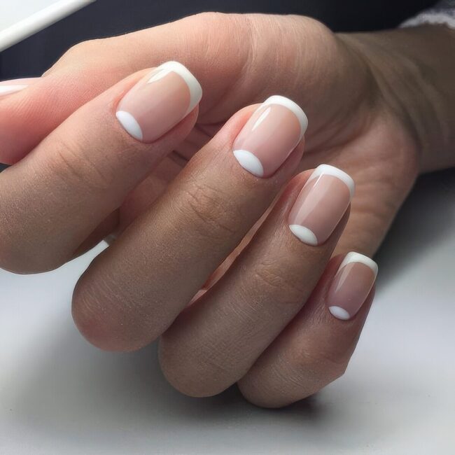 Nude Base with Crisp White Tips Manicure