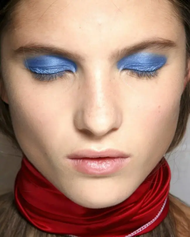 Striking Blue Eyes with Red Accent