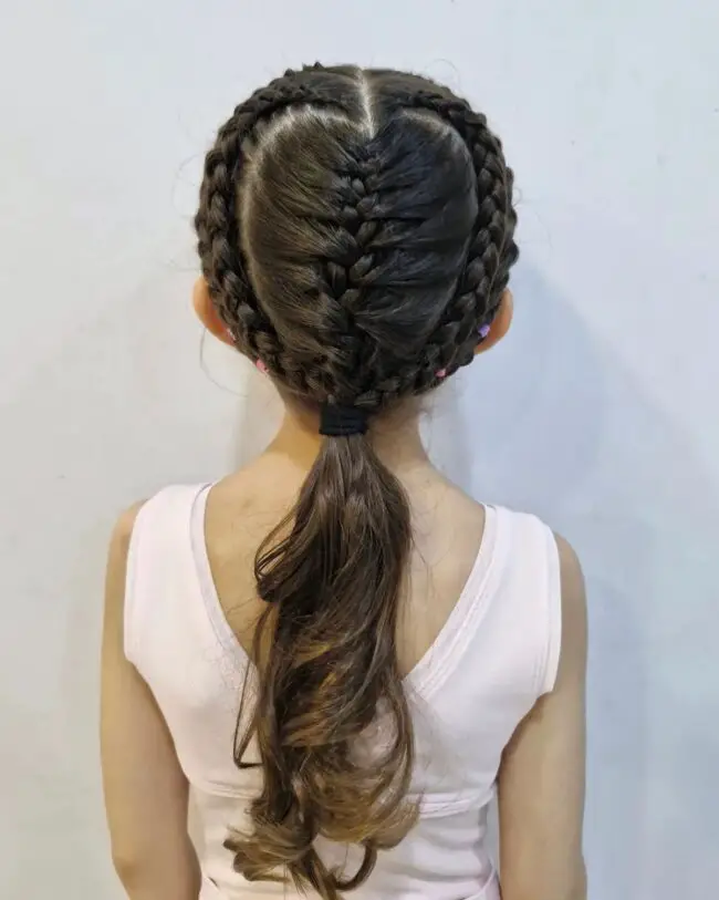 Double Dutch Braids Leading to a Low Ponytail