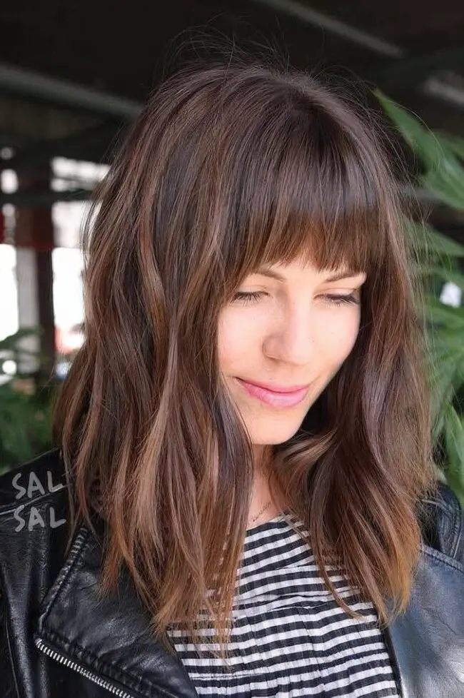 Brown Fringe Bangs with Wavy Dimension