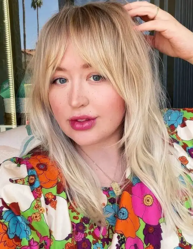 Light Blonde Waves with Curtain Bangs