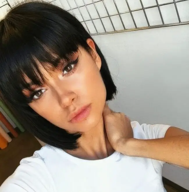 Striking Dark Bob with Youthful Bangs