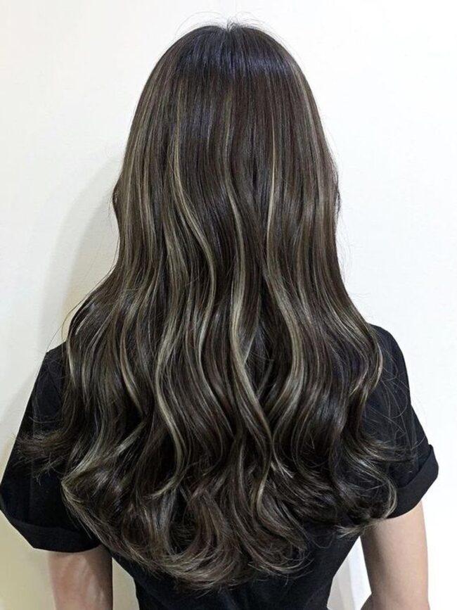 Subtle Blonde Accents on Natural Black Hair
