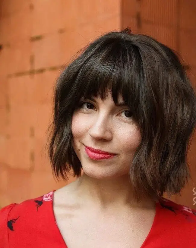 Wavy Brunette Bob with Youthful Bangs