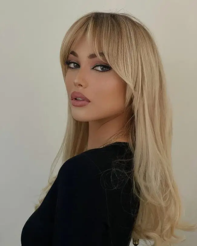 Enchanting Soft Blonde Layered Bangs