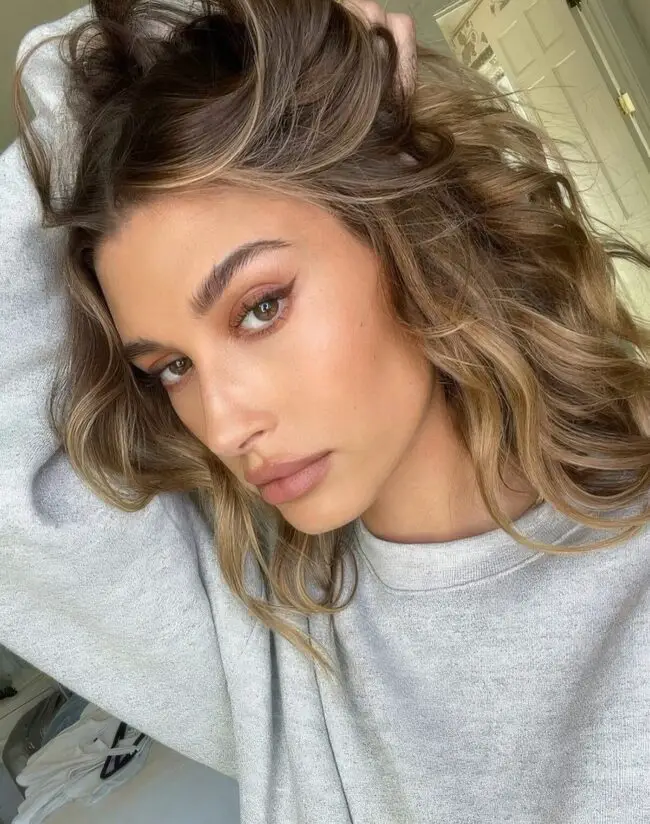 Soft Blonde Waves with Dynamic Curls