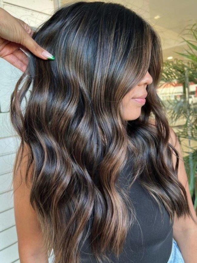 Lively Caramel Waves on Dark Hair