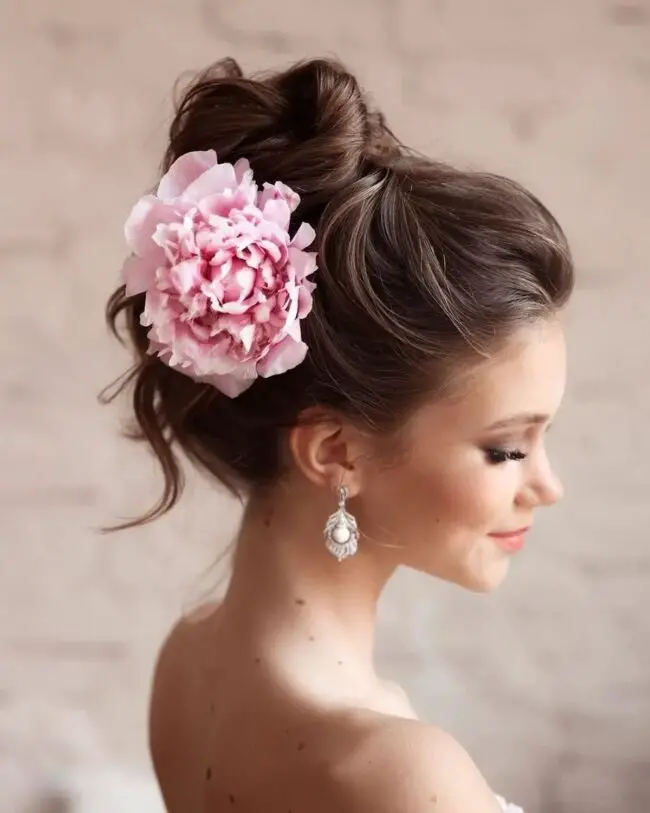 Casual Side Bun with Floral Accent
