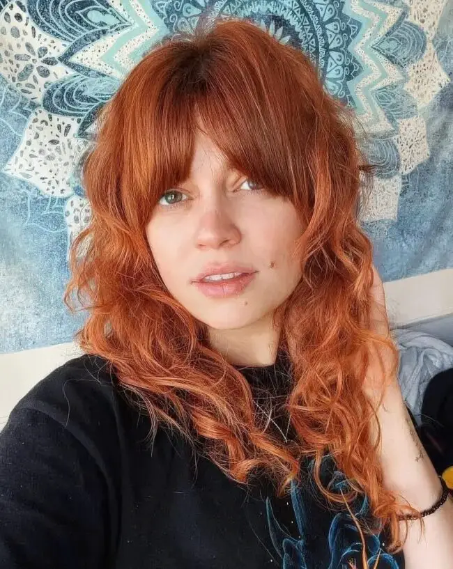 Fiery Curls with Soft Highlights and Volume