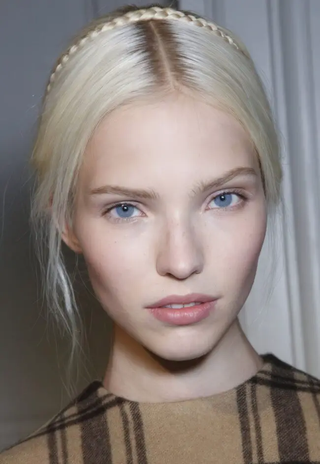 Delicate Blonde Braid with Tousled Bun
