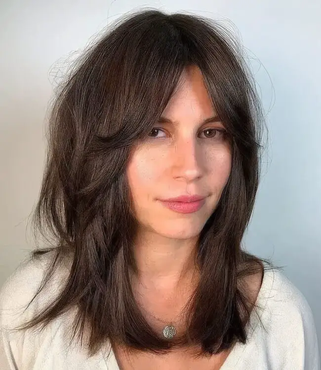 Chestnut Tousled Layers with Radiant Highlights